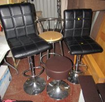 Two bar stools, with leatherette seats, together with two further stools. (4)