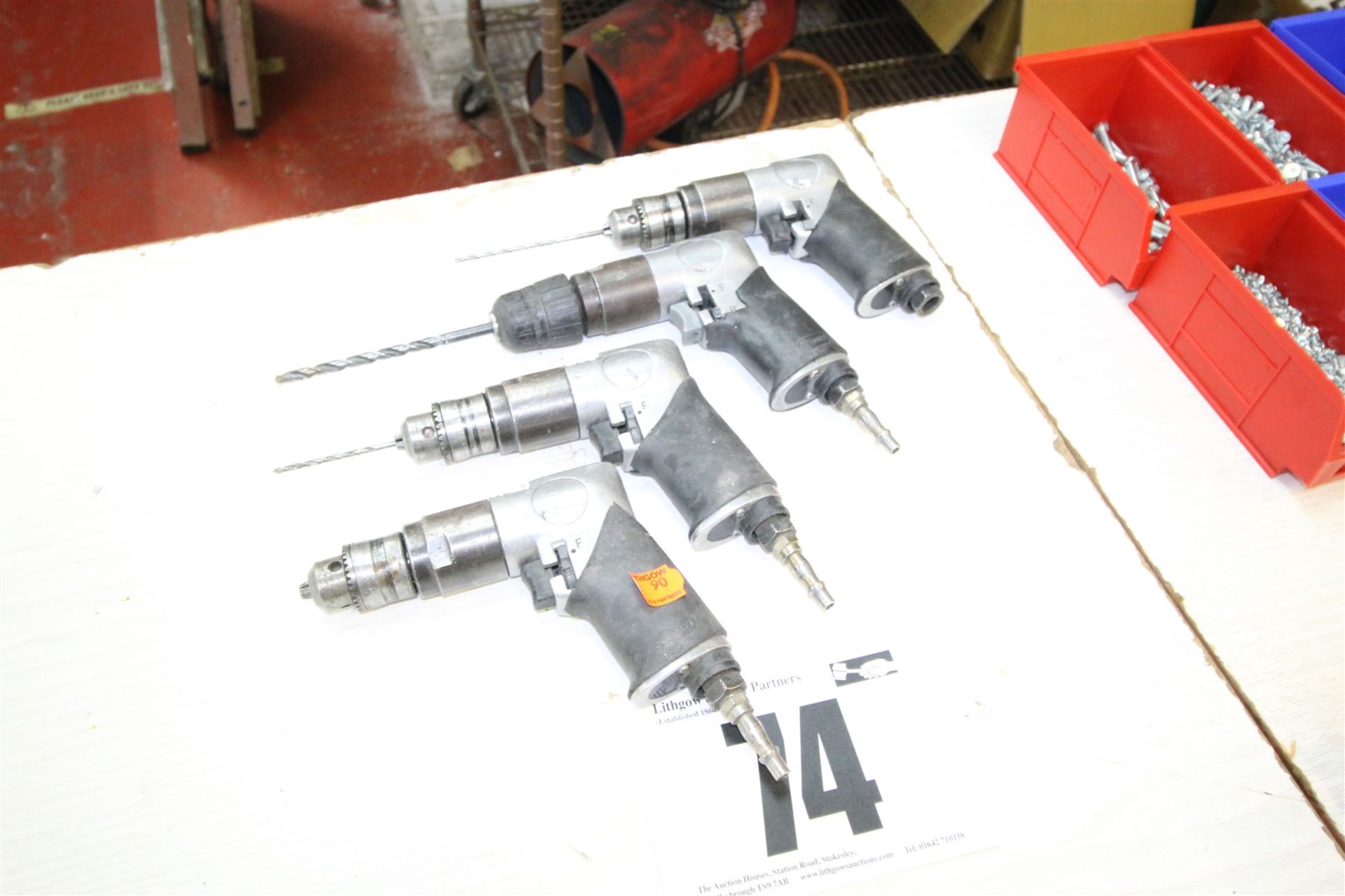 4x AIR OPERATED DRILLS WITH RUBBER HANDLES.