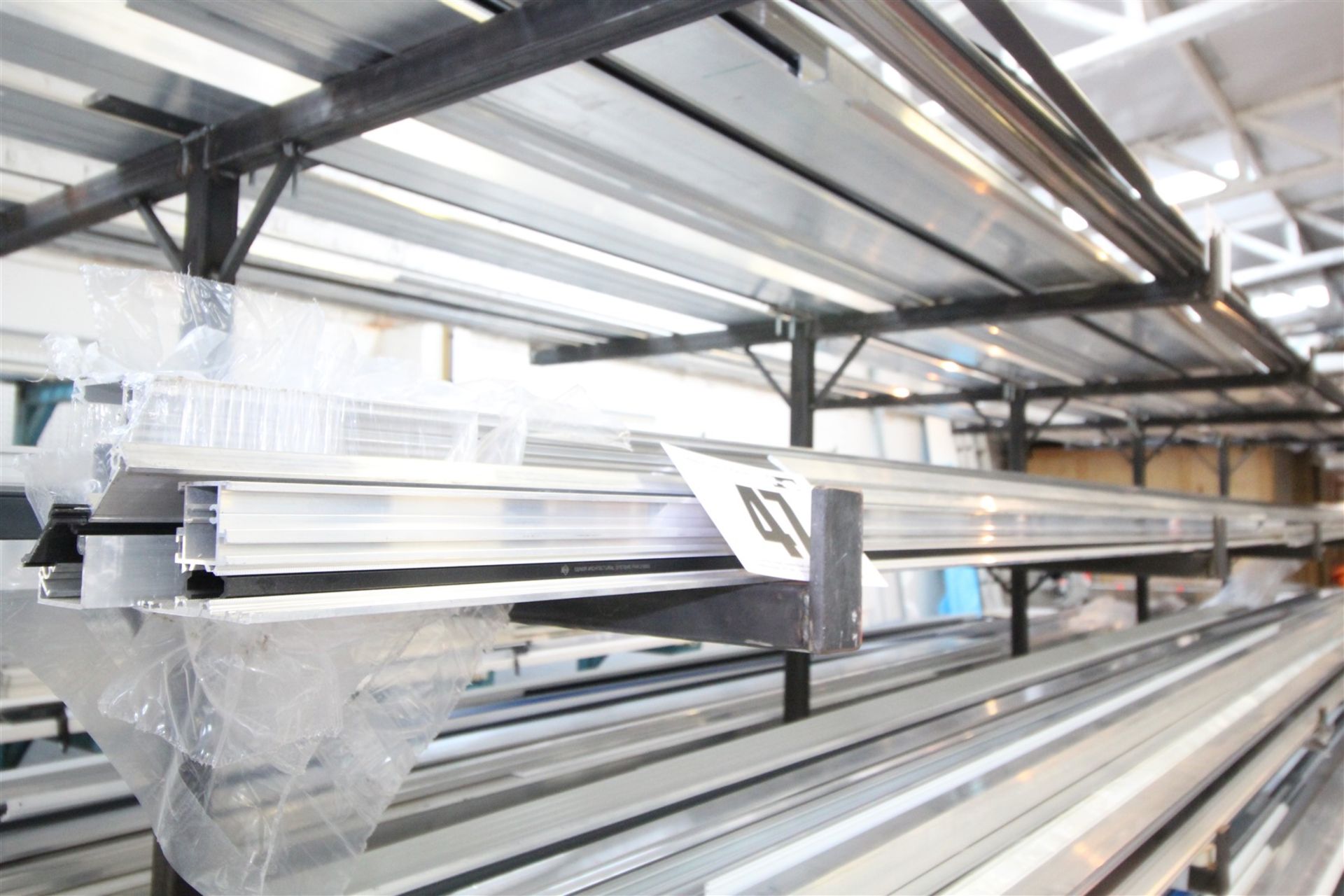 CONTENTS OF 28INCH WIDE SHELF OF RACK OF 5M LONG & SHORTER ALUMINIUM EXTRUSION & BOX SECTION.