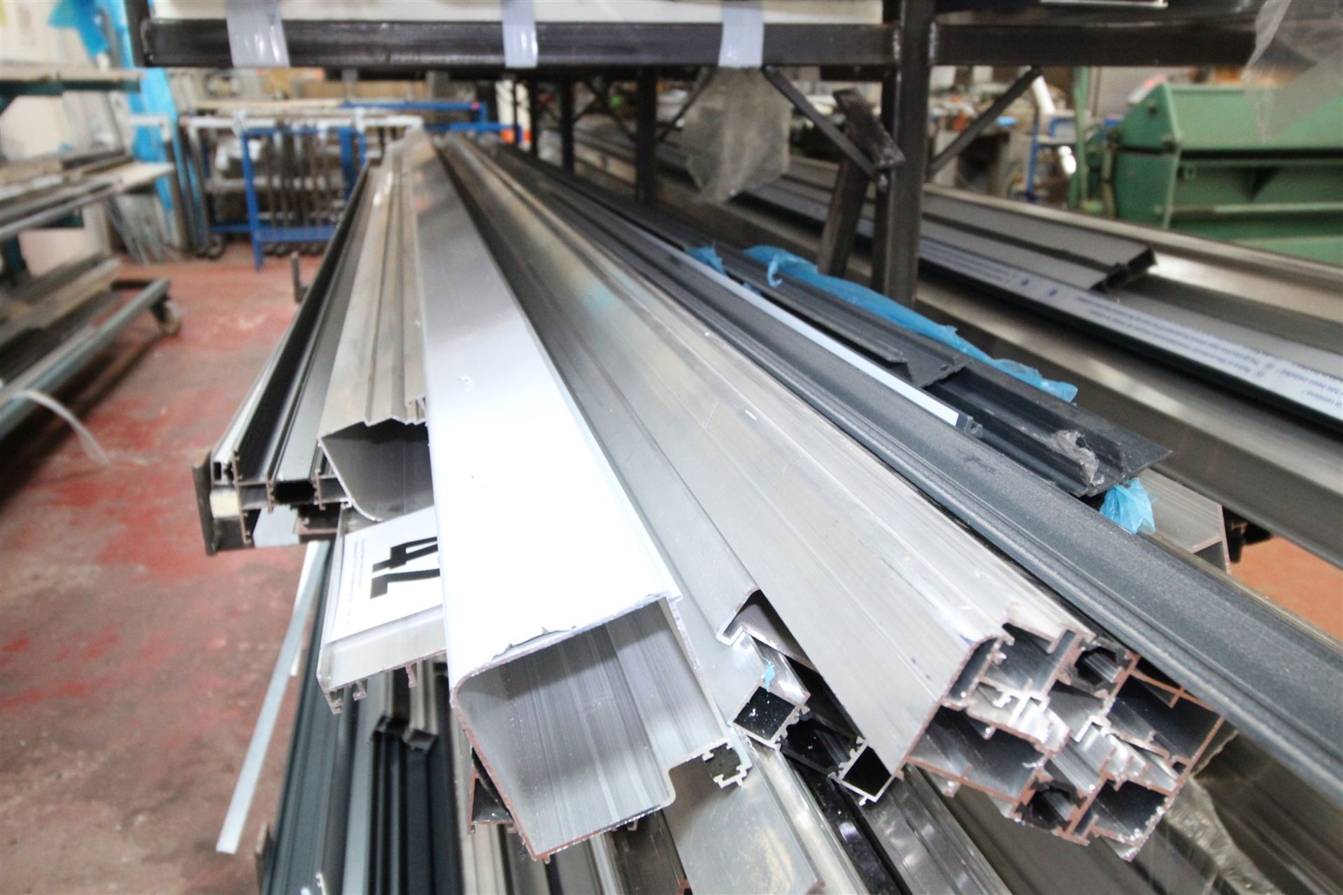 CONTENTS OF 28INCH WIDE SHELF OF RACK OF 5M LONG & SHORTER ALUMINIUM BOX SECTION & EXTRUSION.