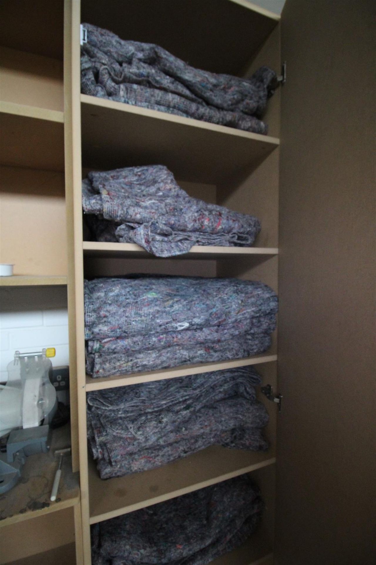 CONTENTS OF 5 SHELVES OF RACK OF REMOVAL MANS BLANKETS