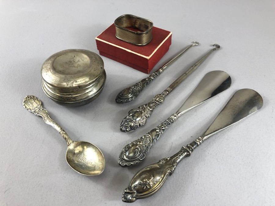 Collection of silver items to include a silver lidded pot, napkin ring in box and a selection of