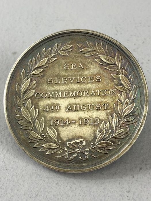 A silver medallion, The Sure Shield 1914-1919 -On 4 August 1919 a pageant was held on the River - Image 2 of 4