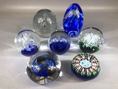 Good collection of seven contemporary art glass paperweights, of varying design, the tallest