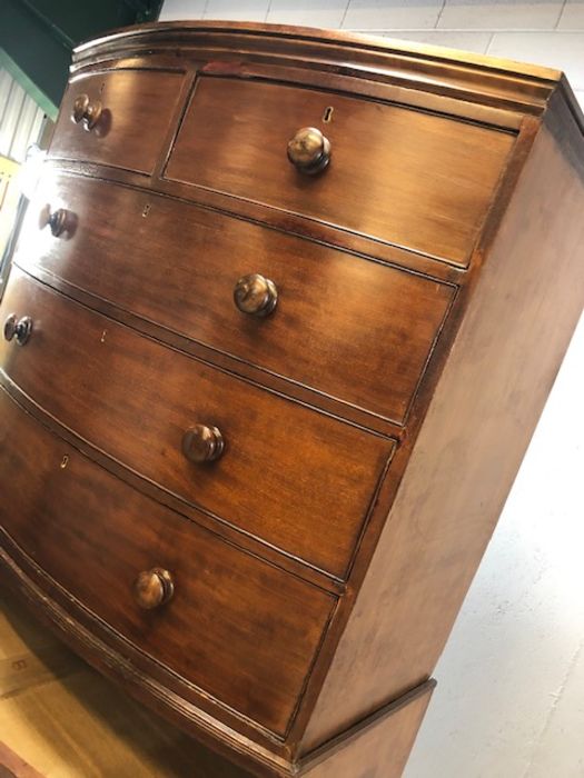 Mahogany bow fronted chest on chest of eight drawers, with turned bun handles, raised on bracket - Image 11 of 15
