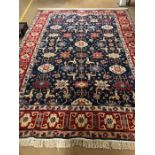 Large blue ground, woollen rug with all over design, approx 395cm x 278cm