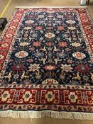 Large blue ground, woollen rug with all over design, approx 395cm x 278cm