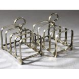 Pair of Hallmarked Silver Toast racks hallmarked for Birmingham by maker Synyer & Beddoes (Harry