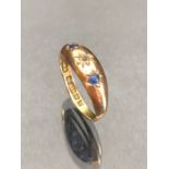 Fully Hallmarked Gold pinkie ring set with gemstones approx size E