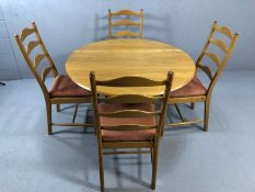 ERCOL drop leaf dining table, approx 124cm x 102cm x 73 cm tall (fully extended), accompanied by