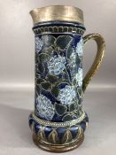 LARGE DOULTON LAMBETH JUG with hallmarked silver collar and spout, with a painted floral design on a