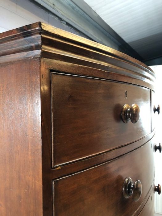 Mahogany bow fronted chest on chest of eight drawers, with turned bun handles, raised on bracket - Image 6 of 15