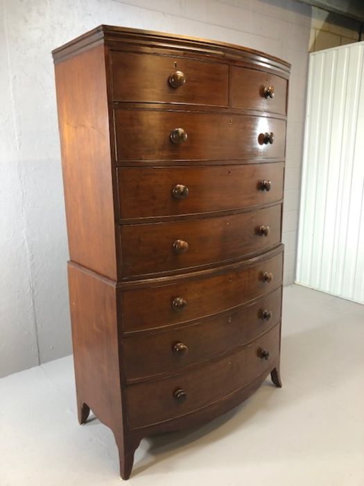 Mahogany bow fronted chest on chest of eight drawers, with turned bun handles, raised on bracket - Image 2 of 15
