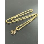 14ct Gold twisted Gold chain with 9ct gold star pendant (total weight approx 2.5g