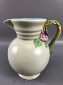 CLARICE CLIFF Newport Pottery jug, Shape No.895 'My Garden', cream glaze with Autumnal coloured