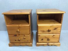 Pair of pine bedside cabinets each with shelf and two drawers