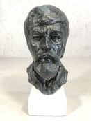 Plaster bust of a gentleman's head, painted black, on a white base, approx 45cm tall
