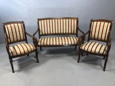 French style salon suite comprising two seater sofa and two chairs each with oak frames and scroll