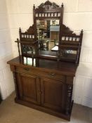 Mahogany buffet or chiffonier with cupboard and drawer under, bevel edged glass and upstand,