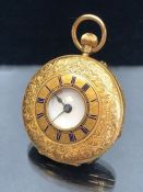 18ct gold half hunter fob watch with blue enamel subsidiary dial.Approx 53.7g (untested)