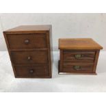 Two wooden desk top sets of miniature drawers, the largest approx 28cm x 28cm x 36cm