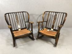 Pair of Mid Century wheelback rocking armchairs (no cushions)