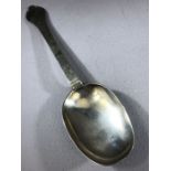 A WILLIAM & MARY TREFID SPOON with a reeded rattail, scratched "RW" on the back of the terminal with
