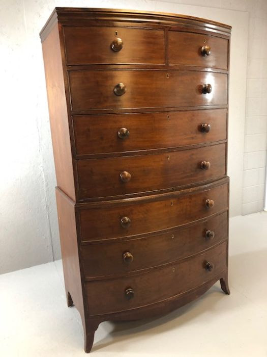 Mahogany bow fronted chest on chest of eight drawers, with turned bun handles, raised on bracket - Image 15 of 15