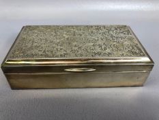 Silver 950 continental cigarette box highly decorated and initialled to the hinged lid approx 5.3
