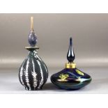 OKRA - Two contemporary art glass scent bottles, the first of squat design, with iridescent