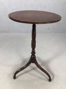 Antique occasional or wine table on turned column support and tripod legs, approx 42cm in diameter