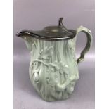 Antique ceramic Jug with Silver coloured hinged lid and Oak leaf decoration approx 21cm tall