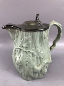 Antique ceramic Jug with Silver coloured hinged lid and Oak leaf decoration approx 21cm tall