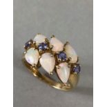 9ct Gold ring set with six pear shaped Opals and Amethyst gemstones approx size 'T' and total weight