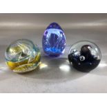 Three Caithness art glass paperweights to include 'Affinity' and 'Floral Dance'