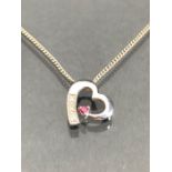 9ct Heart shaped pendant set with diamonds on a silver chain