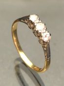 18ct Gold and platinum set Three stone Diamond ring approx size 'O'