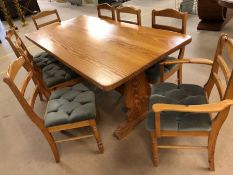 Large pine farmhouse table with pegged central stretcher and eight pine chairs, table approx 183cm x