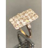 Rectangular pavé Art Deco ring set with 28 diamonds and two further diamonds to the shoulders.
