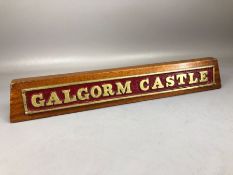 Brass train name plaque for the 'Galgorm Castle' mounted on wooden plinth, with presentation