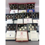 Collection of ten Royal Mint Proof coin collection packs in leather wallets with paperwork of