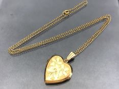 9ct Gold Heart shaped locket on a unmarked Gold chain (total weight approx 6.8g)