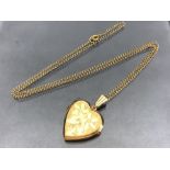 9ct Gold Heart shaped locket on a unmarked Gold chain (total weight approx 6.8g)