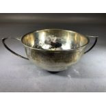 Silver hallmarked twin handled bowl approx 11cm in diameter hallmarked for Birmingham by maker