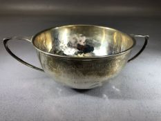 Silver hallmarked twin handled bowl approx 11cm in diameter hallmarked for Birmingham by maker