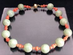 Coral and possibly jade necklace with silver magnetic clasp approx 41cm in length