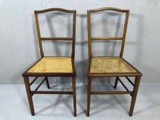 Pair of Edwardian inlaid chairs with cane woven seats