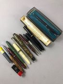 Collection of vintage pens pencils and accessories