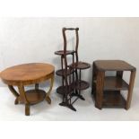 Three items of wooden furniture to include two side tables and a folding double cake stand