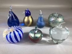 Good collection of seven contemporary art glass paperweights, mostly apple or pear in form, to